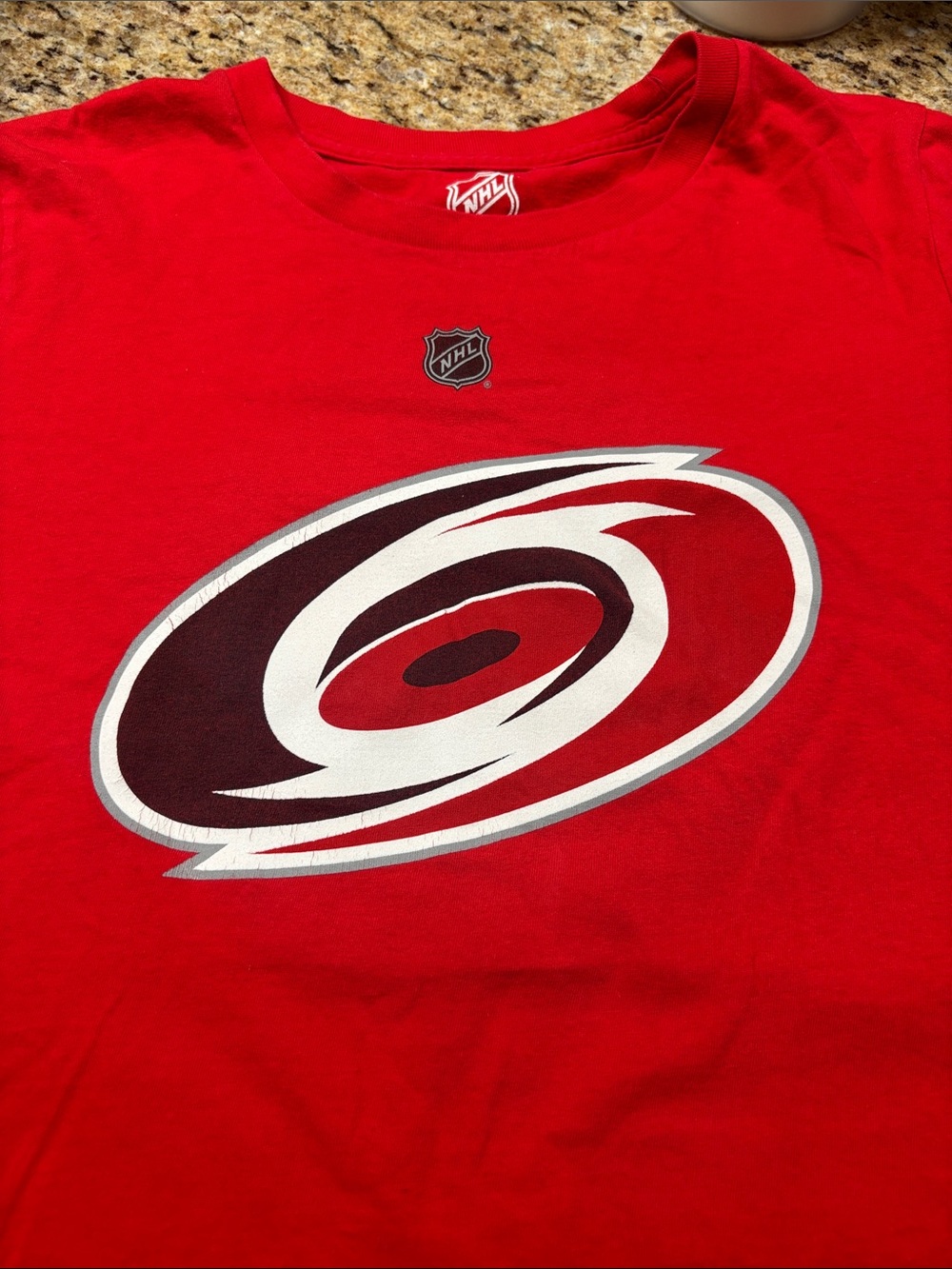 NHL youth Red Graphic Logo T-Shirt size large 14/16 Aho 20 Carolina hurricanes
